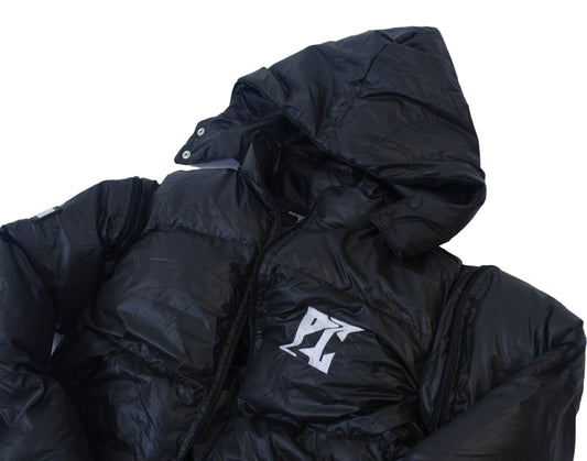 Black PC Convertible Hooded Puffer Jacket by empowering clothing brand, showcasing unisex streetwear trends and inspirational fashion.